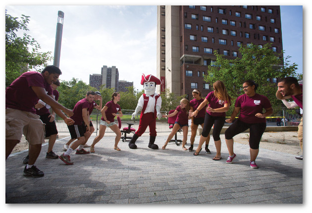 Minuteman mascot and move-in crew welcome students