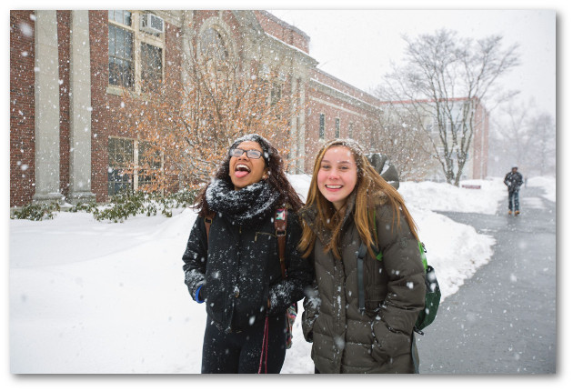 Two students in snow near Morrill